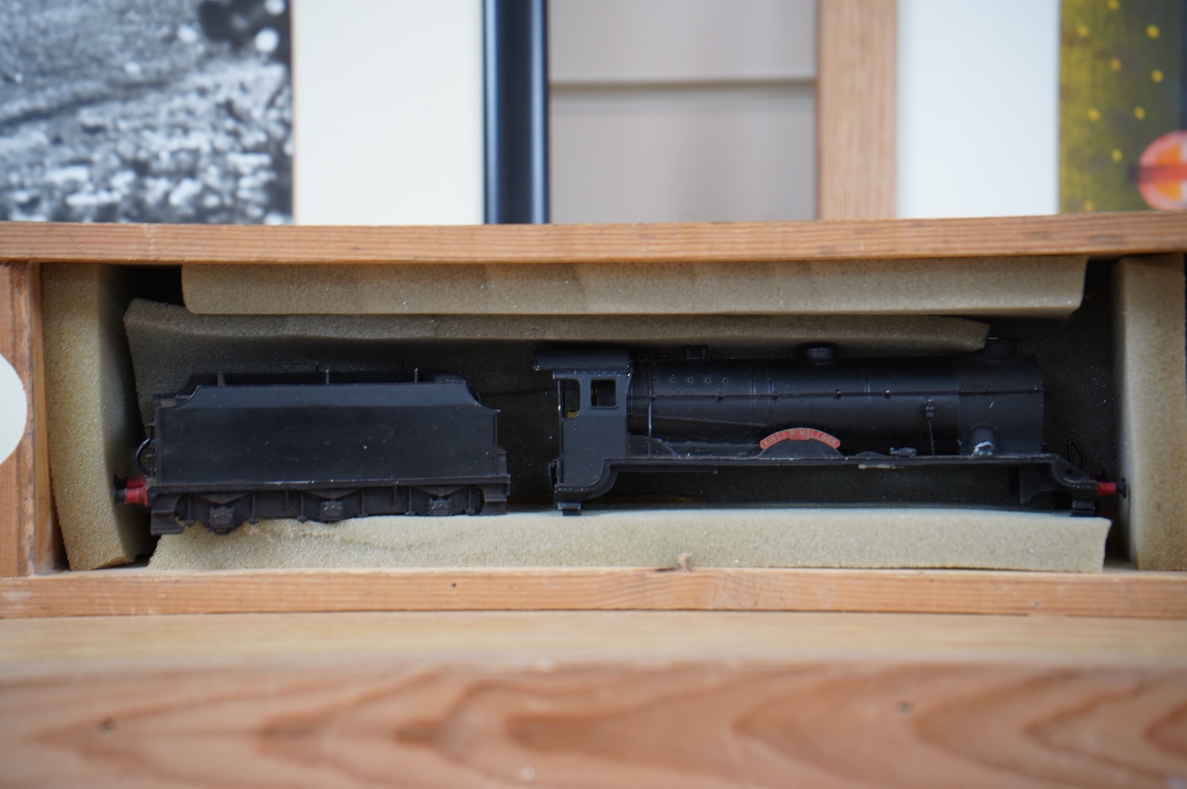 Two kit built and adapted EM gauge LMS railway locomotives; an 0-8-0, 9518, and an 0-6-0 class 4F based on an Airfix kit, together with the body only of an SR Schools Class